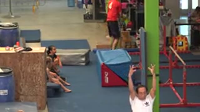 CABO SAN LUCAS MEXICO-2020: Person Wearing White Shirt Holds Arms Up In Indoor