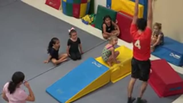 CABO SAN LUCAS MEXICO-2020: Gymnastics Coach Demonstrates The Proper Posture For