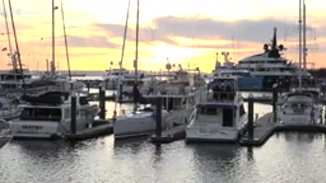 CABO SAN LUCAS MEXICO-2020: Eight Sail And Motor Boats Parked At A Pier During A