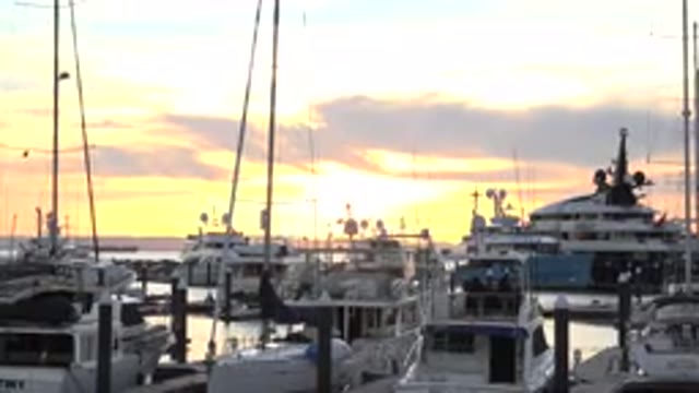 CABO SAN LUCAS MEXICO-2020: Many Boats And Speedboats In A Harbor On The Beach