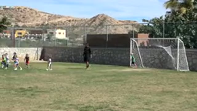 LOS CABOS MEXICO-2019: Kids Are Playing Soccer On A Massive Green Area