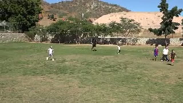 LOS CABOS MEXICO-2019: A Bunch of Little Kids Running on the Grass