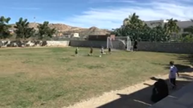 LOS CABOS MEXICO-2019: Parent Recording Children Playing Little League Soccer