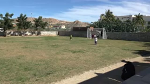 LOS CABOS MEXICO-2019: A Lot Of Kids Playing Soccer And Having Fun In A Big Field