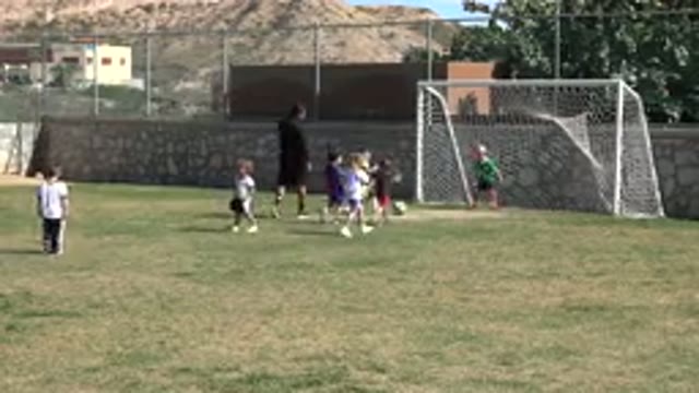 LOS CABOS MEXICO-2019: Many Cute Kids Are Playing Football With Their Coach On A