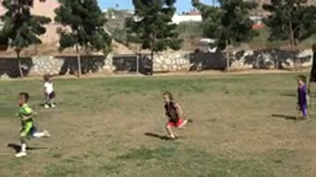LOS CABOS MEXICO-2019: Little Girl Running And Playing Soccer