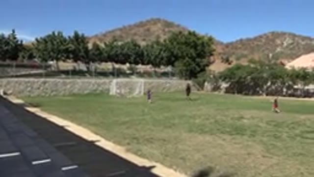 LOS CABOS MEXICO-2019: Students Learning How To Play Soccer With Their Teacher