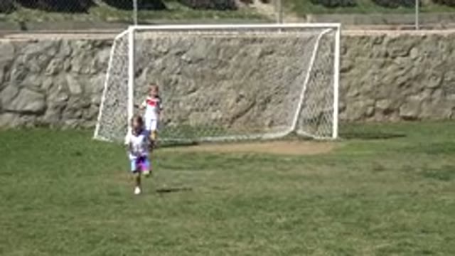 LOS CABOS MEXICO-2019: Children On A Soccer Field And One Of Them Running