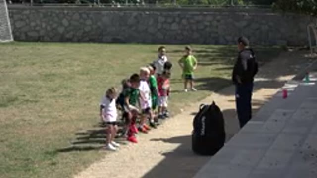 LOS CABOS MEXICO-2019: Pee Wee Soccer Team Doing Stretches Preparing For Practice