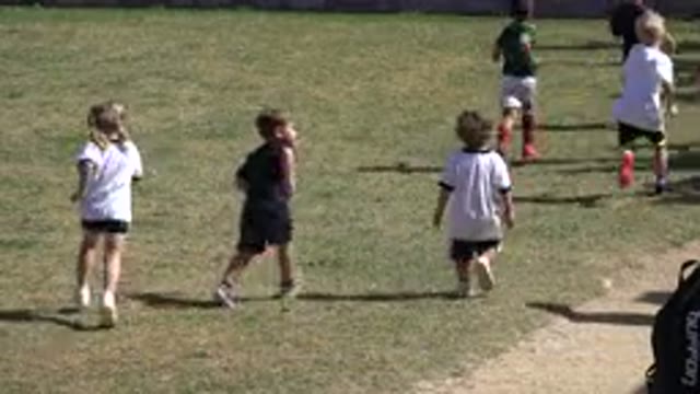 LOS CABOS MEXICO-2019: A Group Of Children With Their Coach Are Running In The
