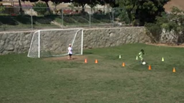 LOS CABOS MEXICO-2019: Children Practicing Soccer Outdoors During Daytime