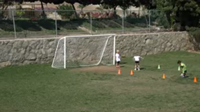 LOS CABOS MEXICO-2019: Children Playing Soccer On A Field And Training In A