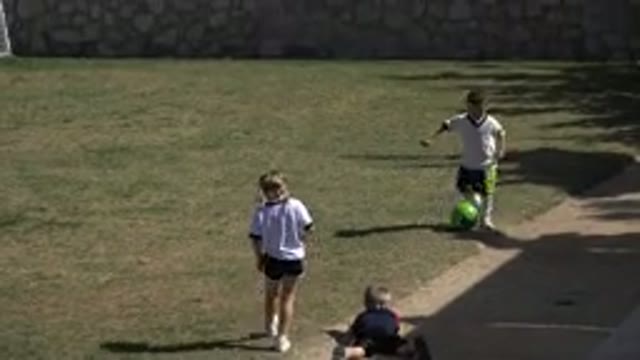 LOS CABOS MEXICO-2019: Children Practicing Soccer Together On A Sunny Day