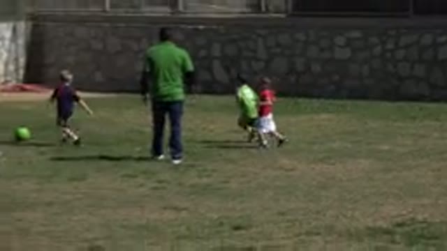 LOS CABOS MEXICO-2019: A Man Acts As A Mentor To Kids In A Park He Is Coaching