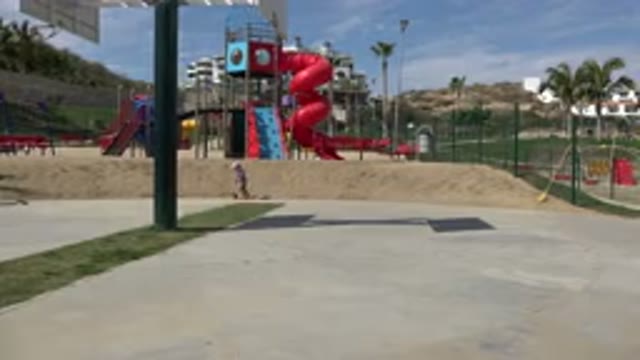 LOS CABOS MEXICO-2019: Child With Protective Equipment Having Fun While Riding A Scooter