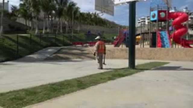 LOS CABOS MEXICO-2019: A Worker Moving an Object to Complete a Fast Job Near