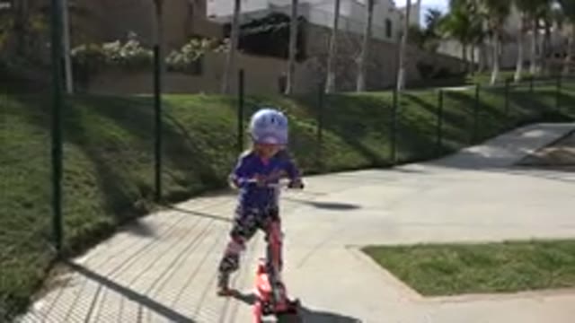 LOS CABOS MEXICO-2019: A Girl With Protective Gear On Rides A Skateboard Through