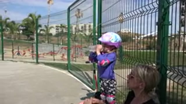LOS CABOS MEXICO-2019: Nanny At The Park With The Children Cooling In The Sun