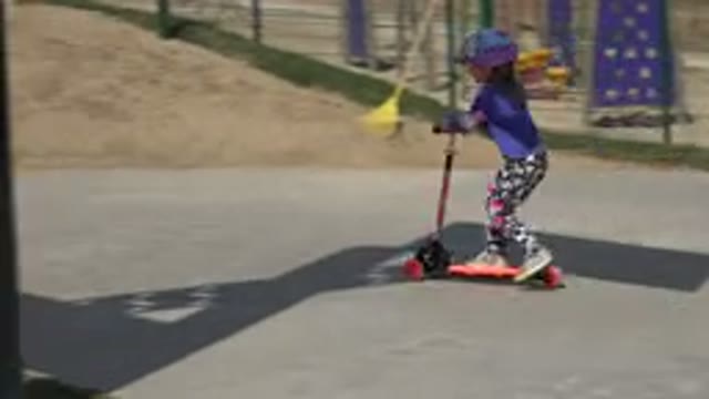 LOS CABOS MEXICO-2019: Young Girl In Safety Gear And Bright Fun Clothing Tries