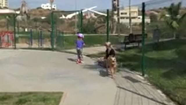 LOS CABOS MEXICO-2019: Mother And Daughter And Their Dog On A Playground