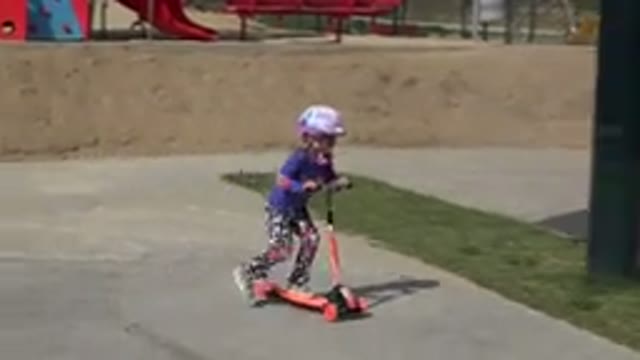 LOS CABOS MEXICO-2019: Little Girl Riding Her Scooter All By Herself
