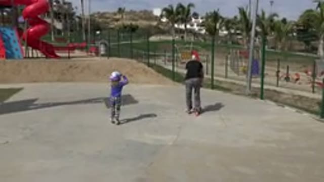 LOS CABOS MEXICO-2019: A Little Boy Is Playing With His Mom In The Park On A
