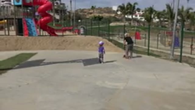 LOS CABOS MEXICO-2019: Woman Attempts To Ride Tiny Children's Scooter Little Girl