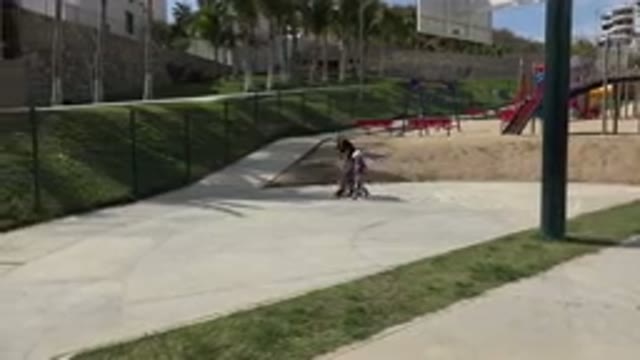 LOS CABOS MEXICO-2019: Little Girl Rides Scooter Previously Occupied By