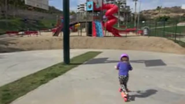 LOS CABOS MEXICO-2019: Children Learn How To Ride A Scooter Down The Park