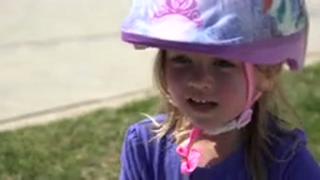 LOS CABOS MEXICO-2019: A Close-Up Of A Blonde Daughter With A Helmet For Safety