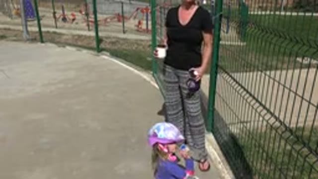 LOS CABOS MEXICO-2019: Mom In Black Shirt Drinking Coffee While Daughter Drinks