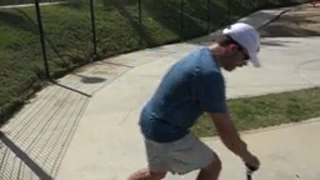 LOS CABOS MEXICO-2019: Young Dad Has Fun On The Scooter At The Park With His Daughter