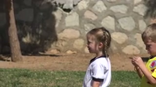 LOS CABOS MEXICO-2019: Three Kids Two Girls And A Boy Playing With A Purple Ball