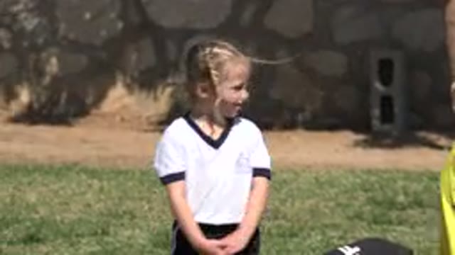 LOS CABOS MEXICO-2019: Happy Little Girl Talking With Other Children