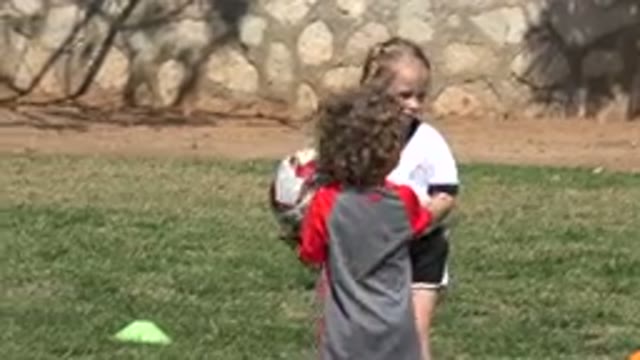 LOS CABOS MEXICO-2019: Children Playing With Football On A Hot And Sunny Day