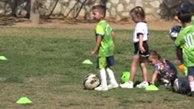 LOS CABOS MEXICO-2019: Future Athlete Kids Running In The Soccer Field During