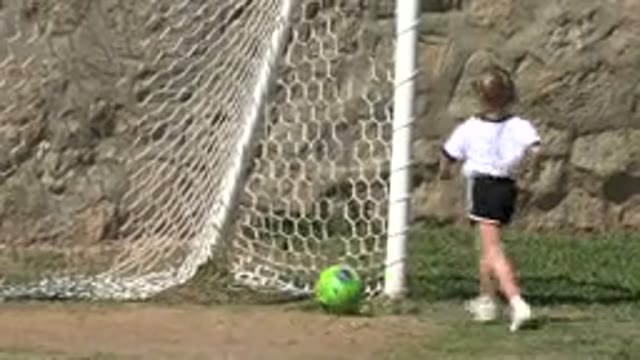 LOS CABOS MEXICO-2019: Little Girl Scores A Goal With A Soccer Ball Outside