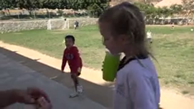 LOS CABOS MEXICO-2019: Multiple Children Playing Football While Parents Offer