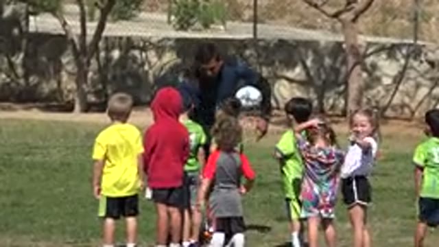 LOS CABOS MEXICO-2019: A Coach Works With Small Children On A Soccer Team On A