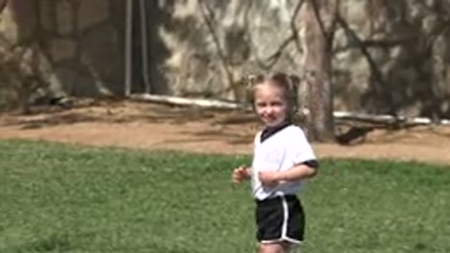 LOS CABOS MEXICO-2019: Cute Blond Girl Wearing Football Equipment