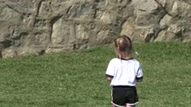 LOS CABOS MEXICO-2019: A Girl Child Walking On The Meadow Near A Stony Wall