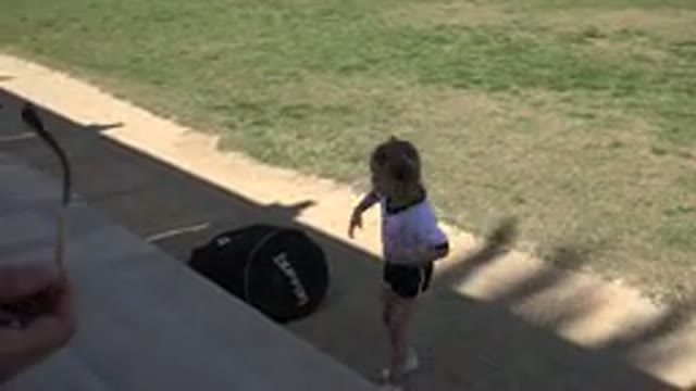 LOS CABOS MEXICO-2019: Little Girl Walks Up Steps At Soccer Game