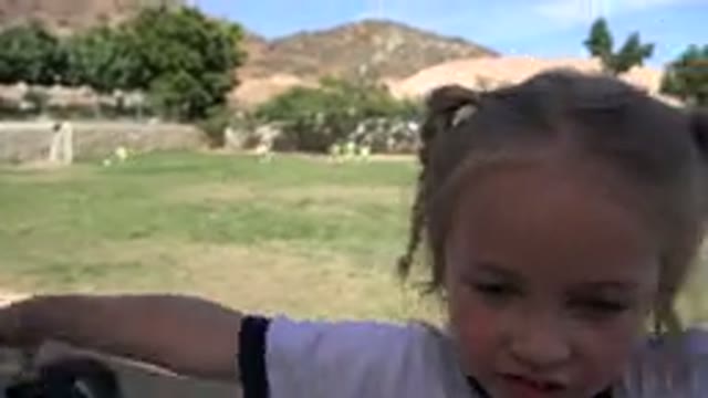 LOS CABOS MEXICO-2019: Little Blonde Girl Interacting With The Camera While A
