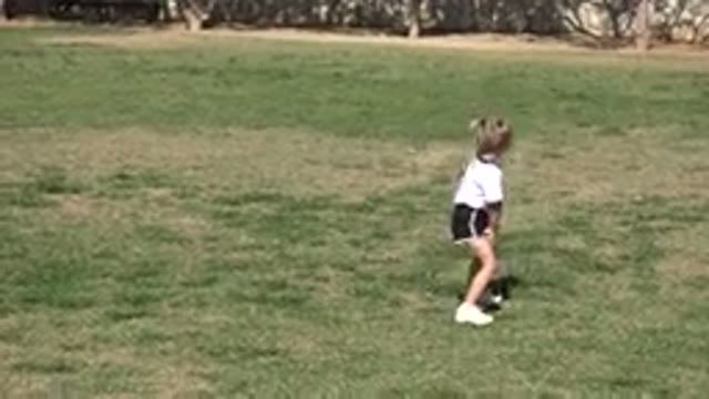LOS CABOS MEXICO-2019: Little Girl in Sports Uniform Running Off the Field