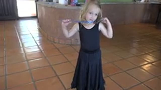 LOS CABOS MEXICO-2019: Girl in Black Dress Puts Hands on Waist to Dance
