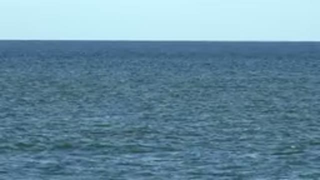 LOS CABOS MEXICO-2019: Sunny Day Beach Sea Calm Water Waves Horizon Steady