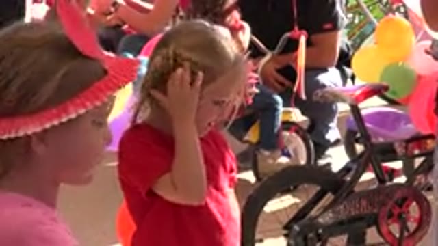 LOS CABOS MEXICO-2019: Girl Wearing Red Shirt Scratches Head On A Sunny Day