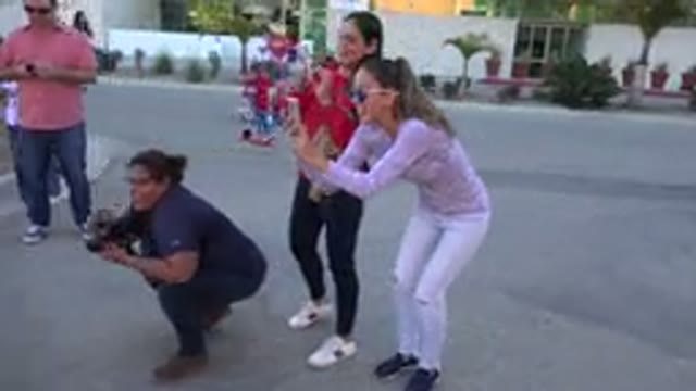 LOS CABOS MEXICO-2019: Mobile Framing Of Adult People Filming Their Children