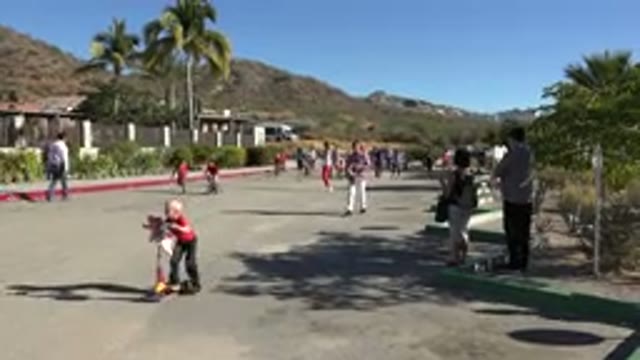 LOS CABOS MEXICO-2019: Children Riding Scooters Outdoors In An Organized Event
