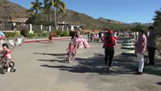 LOS CABOS MEXICO-2019: Children Going Home From Celebrating A Birthday Party On